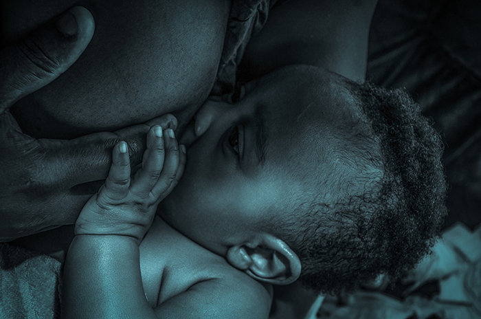 mom breastfeeding child